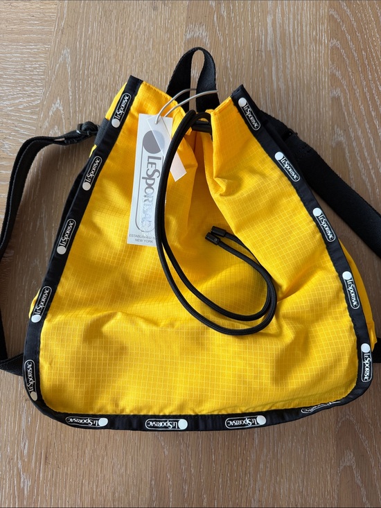 Lesportsac Handbags - NWT LeSportsac NADINE Drawstring Backpack Mango Yellow Perfect Travel Bag Purse